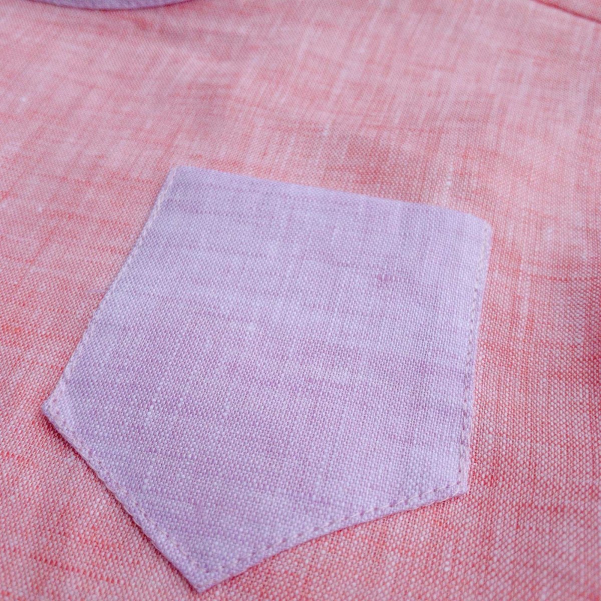 closeup pocket view of Beya Made pink linen top